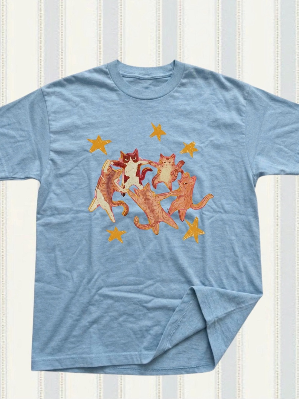Gildan Light Blue Tee with Orange Cat Dance and Gold Stars